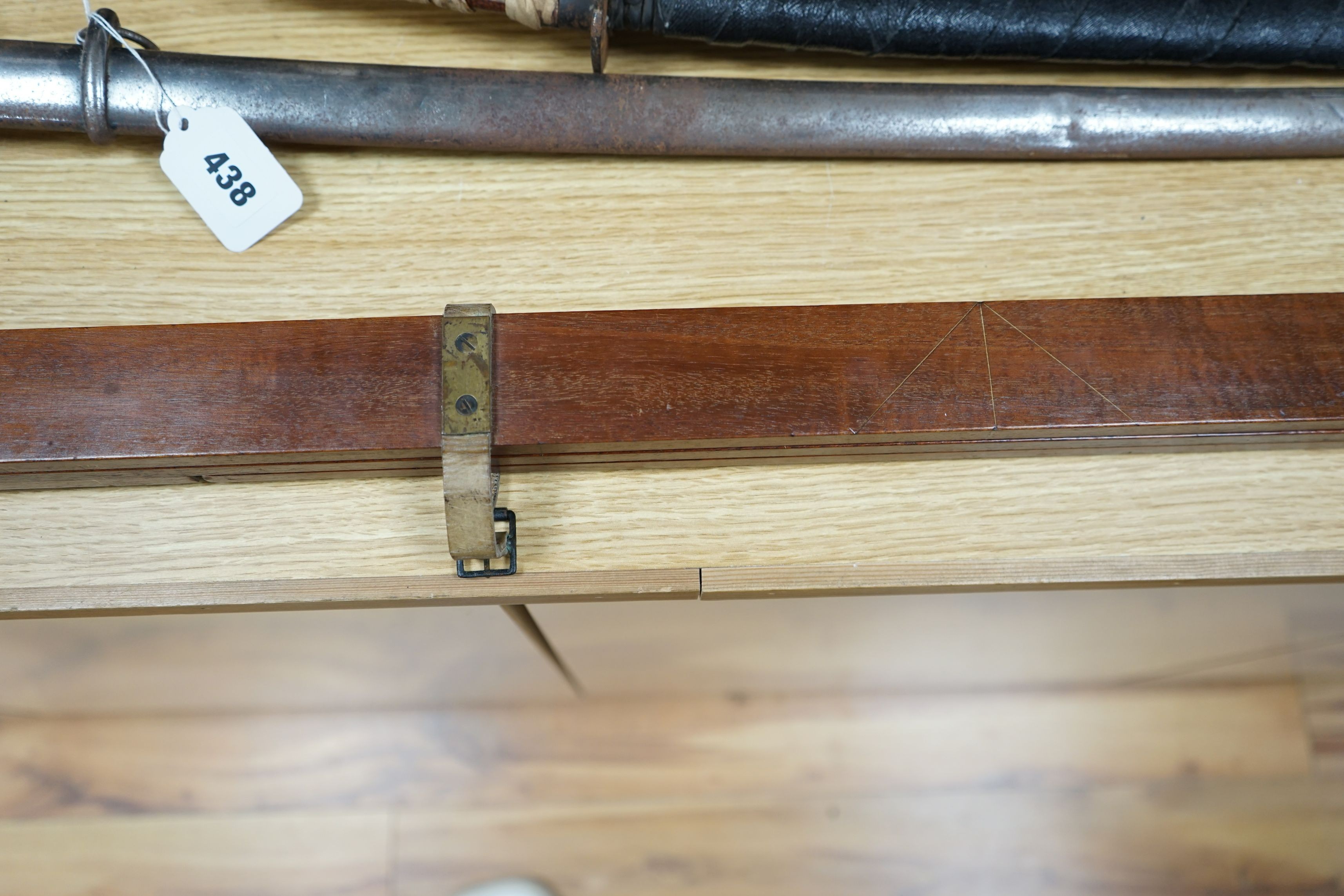 A brass mounted mahogany measure, 126cms long